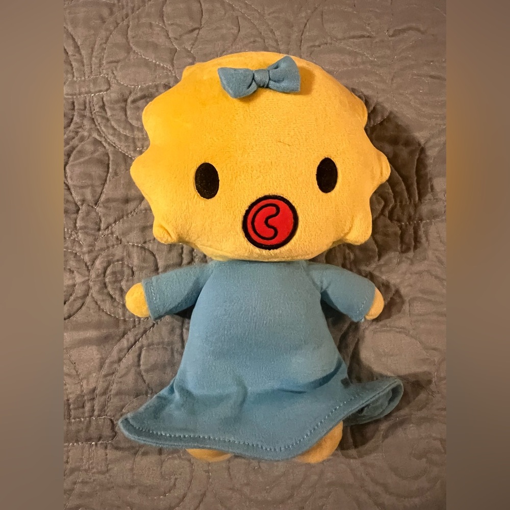 Maggie Simpson plushy